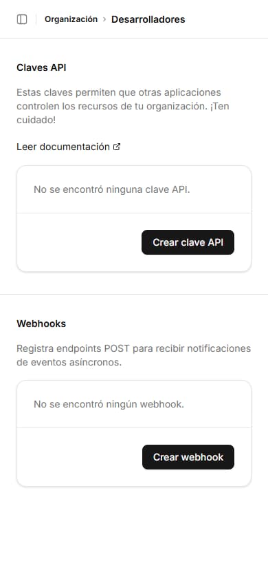 Documentación de API y panel de configuración de webhooks con ejemplos de código y ajustes de integración